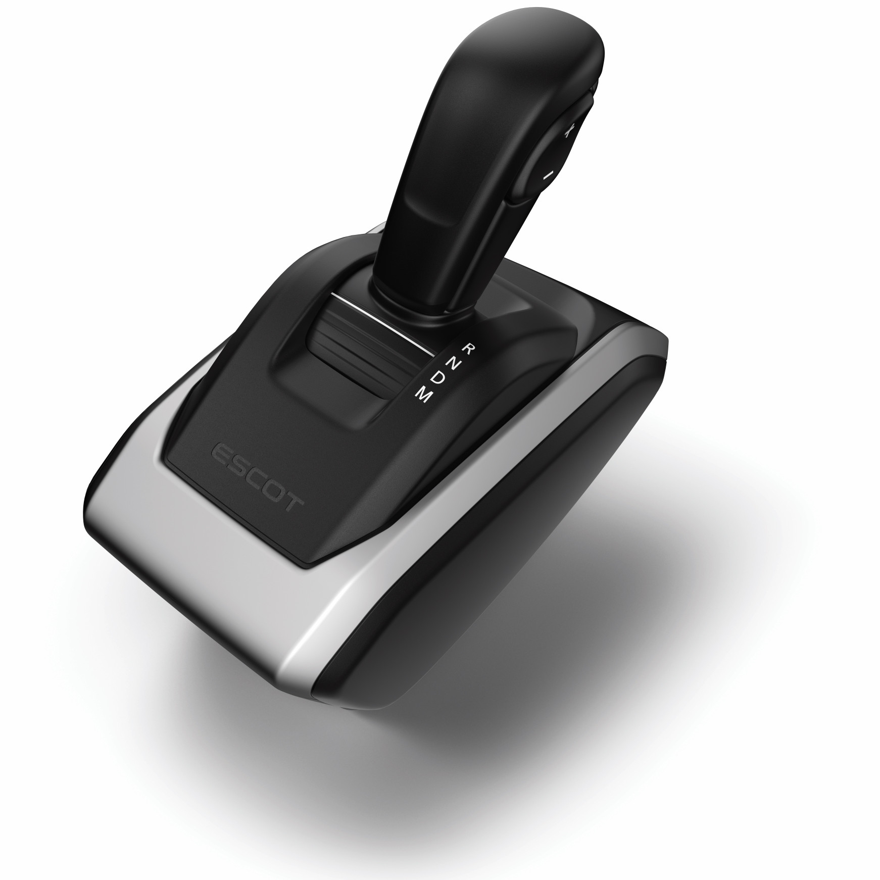 Swichi ya gari ya rangi nyeusi na fedha kwenye uso mweupe.