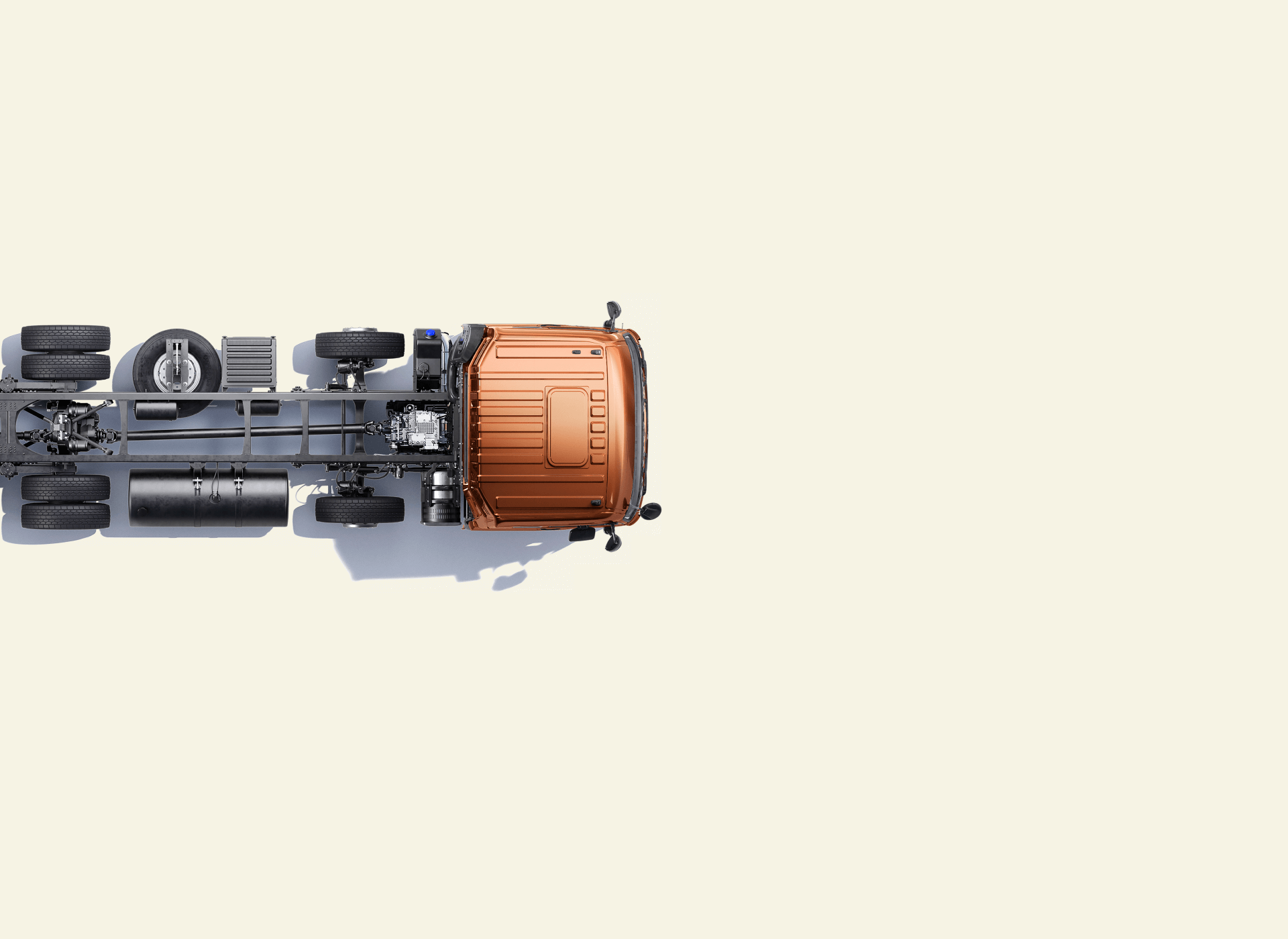 အနီရောင်ထရပ်ကားတစ်စီး၊ အပေါ်ယံရှုထောင့်၊ အလယ်ဘက်။