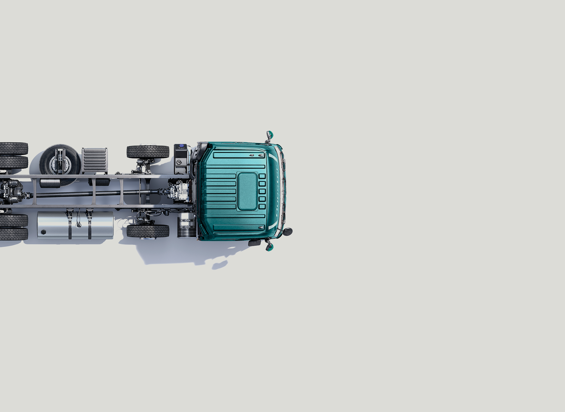 รถกระบะสีเขียวมองจากด้านบนบนพื้นสีขาว